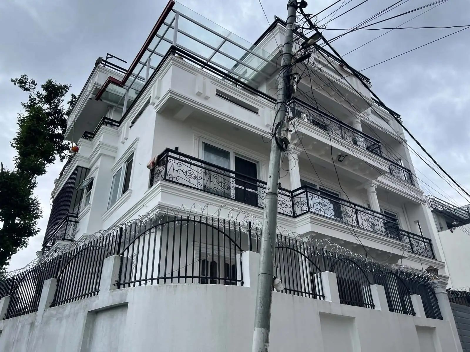 White Four-Storey Residence: Completed four-storey residential building in Nepal, image 1 of 4