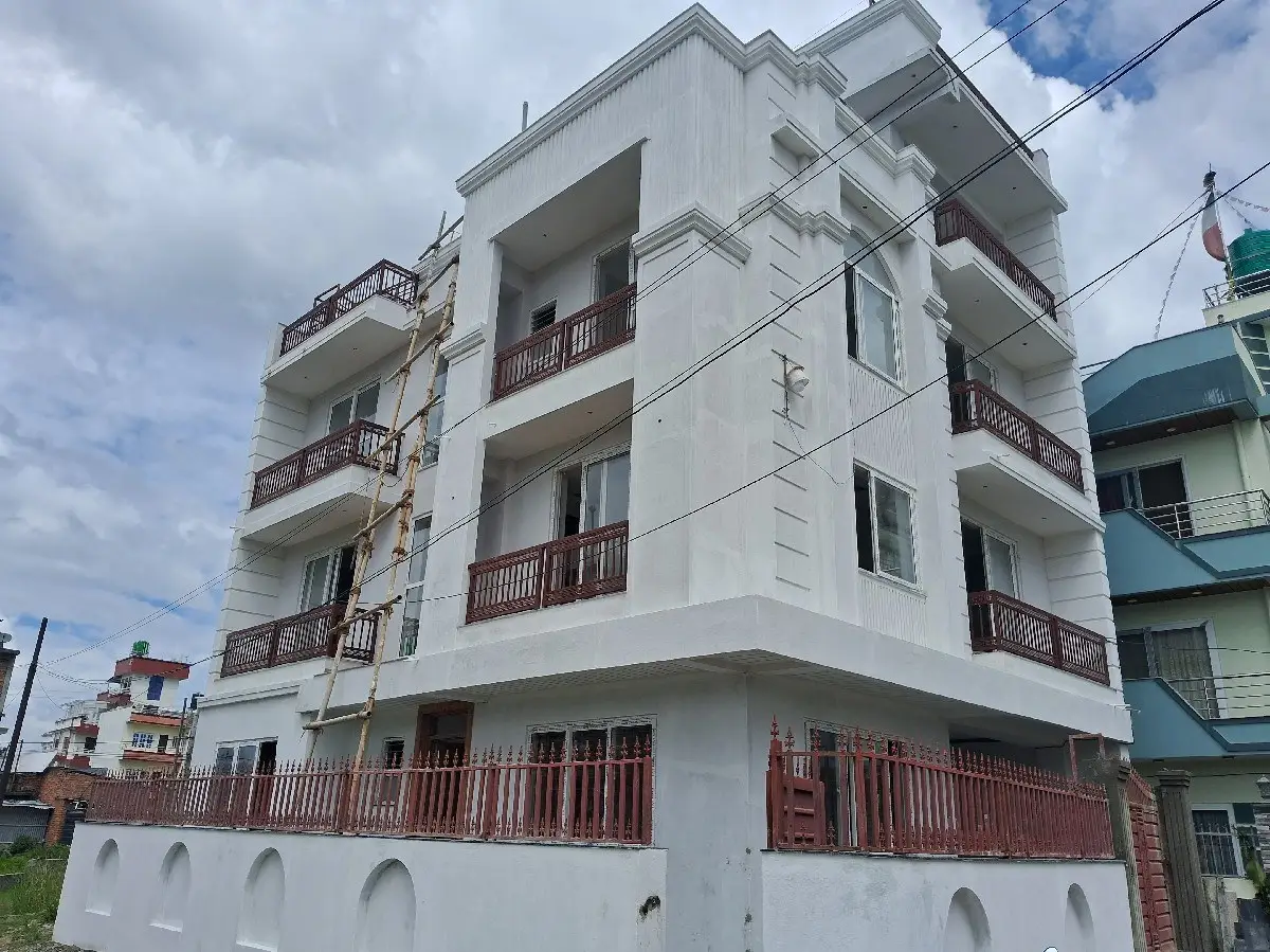 White Balcony Residence: White residential building with balconies, built by HNG, image 1 of 2