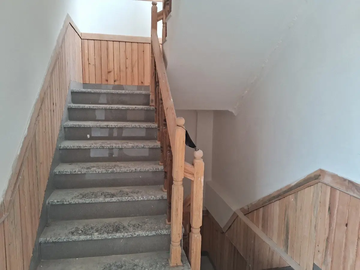 Residence with Wooden Stair: Residence with timber stair and modular kitchen, built by HNG, image 4 of 6